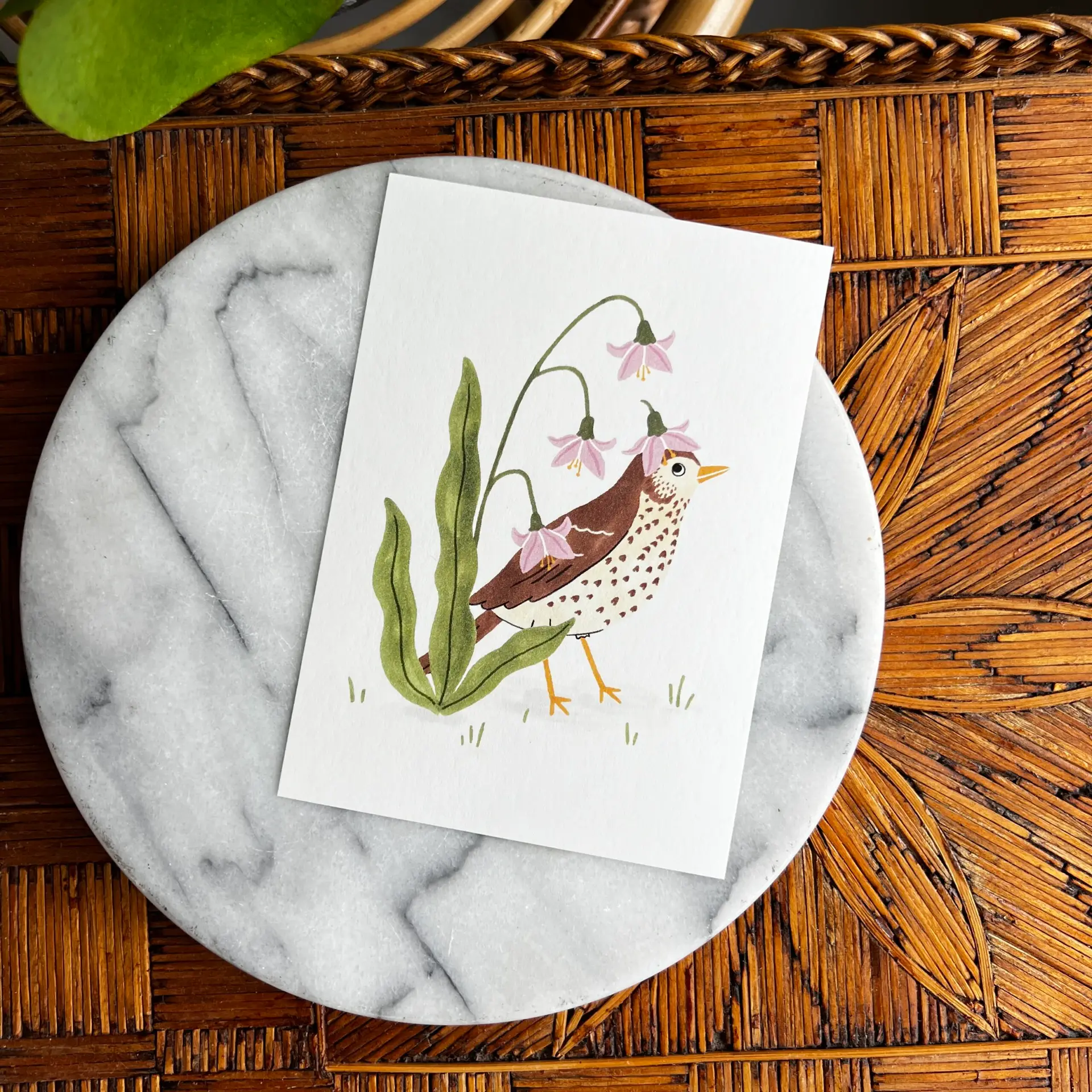 Kaartje met zanglijster en bloempje